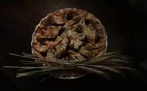 brown dried fish on brown wicker basket